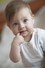 Image showing cute little newborn baby smilling