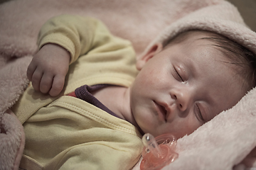 Image showing newborn baby sleeping at home in bed