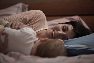 Image showing mother is playing with baby at home