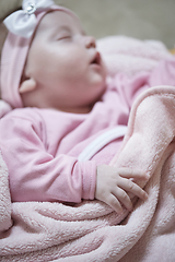 Image showing newborn baby sleeping at home in bed