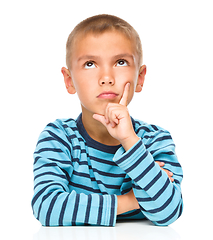 Image showing Portrait of a pensive little boy