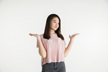 Image showing Beautiful girl\'s half-length portrait on white studio background