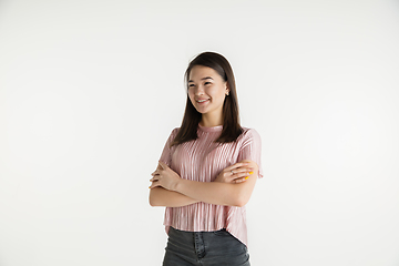 Image showing Beautiful girl\'s half-length portrait on white studio background