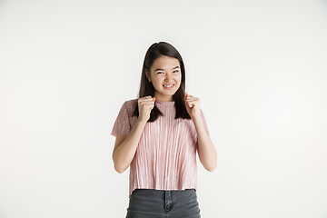 Image showing Beautiful girl\'s half-length portrait on white studio background