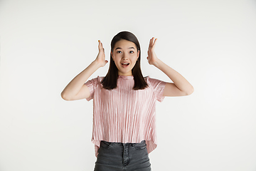 Image showing Beautiful girl\'s half-length portrait on white studio background