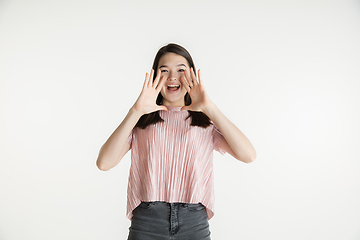 Image showing Beautiful girl\'s half-length portrait on white studio background