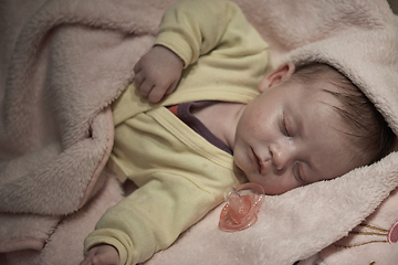 Image showing newborn baby sleeping at home in bed