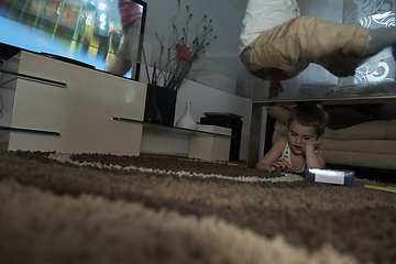 Image showing Little child playing with sister at home