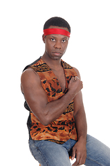 Image showing Serious looking African man in a vest