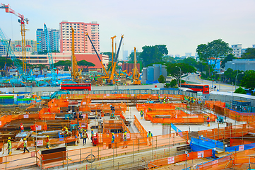 Image showing Workers construction site basement. Singapore