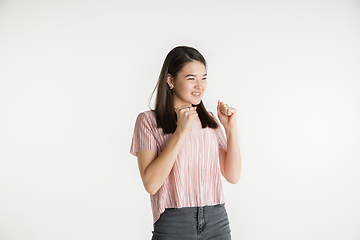 Image showing Beautiful girl\'s half-length portrait on white studio background