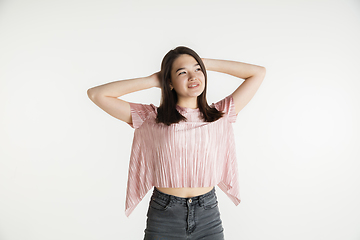 Image showing Beautiful girl\'s half-length portrait on white studio background