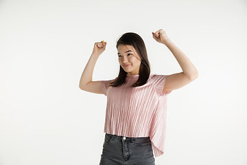 Image showing Beautiful girl\'s half-length portrait on white studio background