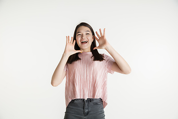 Image showing Beautiful girl\'s half-length portrait on white studio background