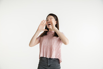 Image showing Beautiful girl\'s half-length portrait on white studio background