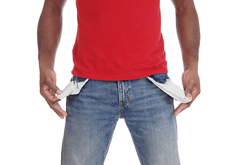 Image showing Closeup of man showing empty pockets