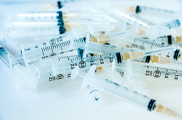 Image showing Syringes on blue background