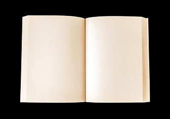 Image showing Old open blank book isolated on black