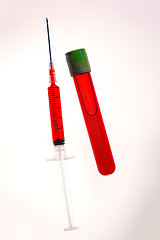 Image showing Syringe and tube with blood on white background