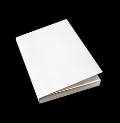 Image showing Closed blank book isolated on black