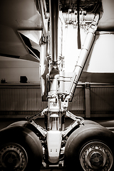 Image showing Airplane landing gear detail. Black and white photo