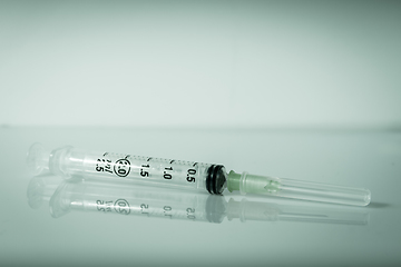 Image showing Syringe on grey background