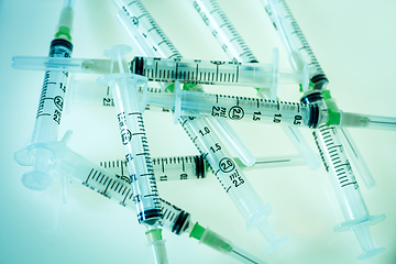 Image showing Syringes on blue background