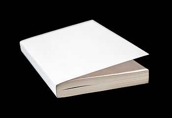 Image showing Closed blank book isolated on black