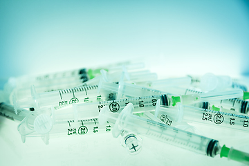 Image showing Syringes on blue background