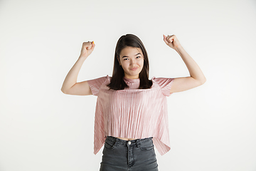 Image showing Beautiful girl\'s half-length portrait on white studio background