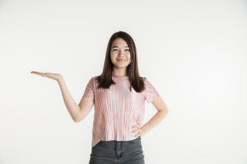 Image showing Beautiful girl\'s half-length portrait on white studio background