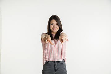 Image showing Beautiful girl\'s half-length portrait on white studio background