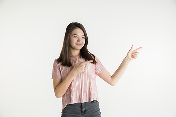 Image showing Beautiful girl\'s half-length portrait on white studio background