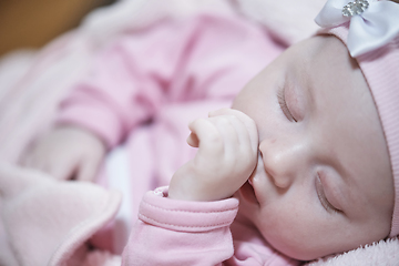 Image showing newborn baby sleeping at home in bed