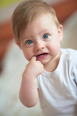 Image showing cute little newborn baby smilling