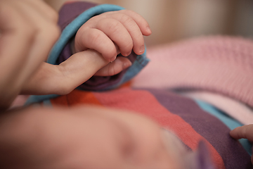 Image showing mother is playing with baby at home