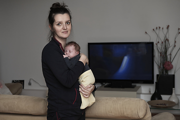 Image showing mother is playing with baby at home