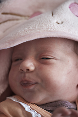 Image showing One month newborn baby sleeping in bed