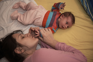 Image showing mother is playing with baby at home