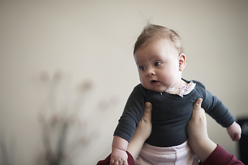 Image showing mother is playing with baby at home