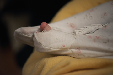 Image showing One month newborn baby sleeping in bed