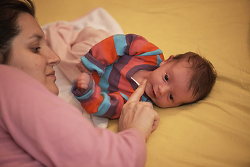 Image showing mother is playing with baby at home