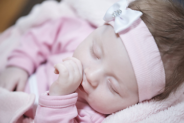 Image showing newborn baby sleeping at home in bed