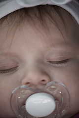 Image showing newborn baby sleeping at home in bed