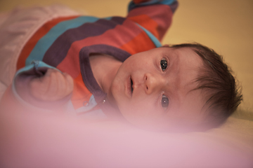 Image showing One month newborn baby sleeping in bed