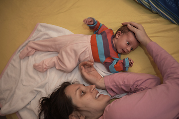 Image showing mother is playing with baby at home