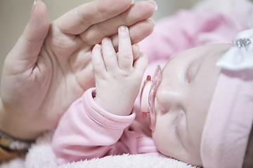 Image showing mother is playing with baby at home