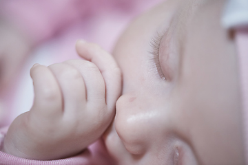 Image showing newborn baby sleeping at home in bed