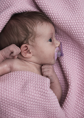 Image showing One month newborn baby sleeping in bed