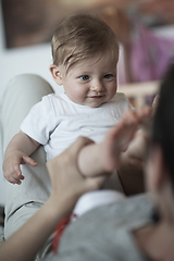 Image showing mother is playing with baby at home